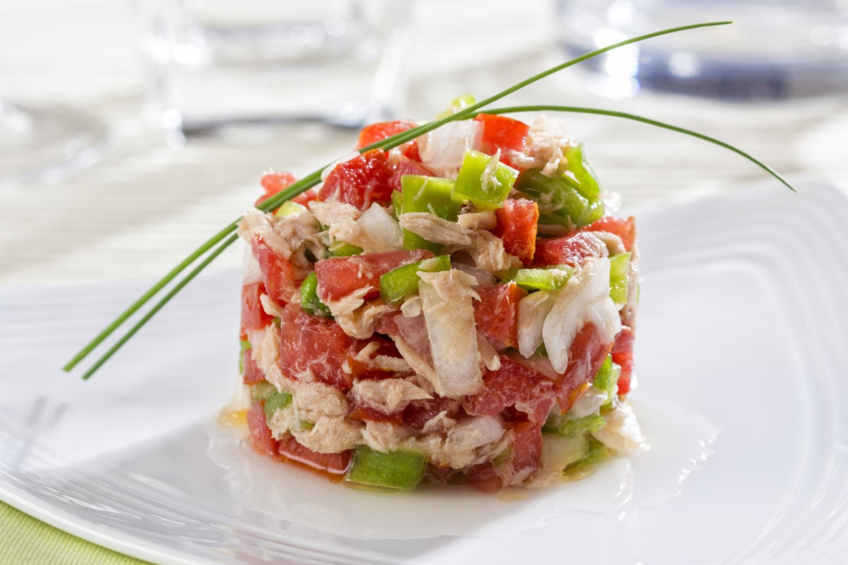 A serving of tuna salad on plate