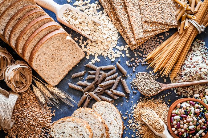 Various grains including breads, pasta and loose whole grains